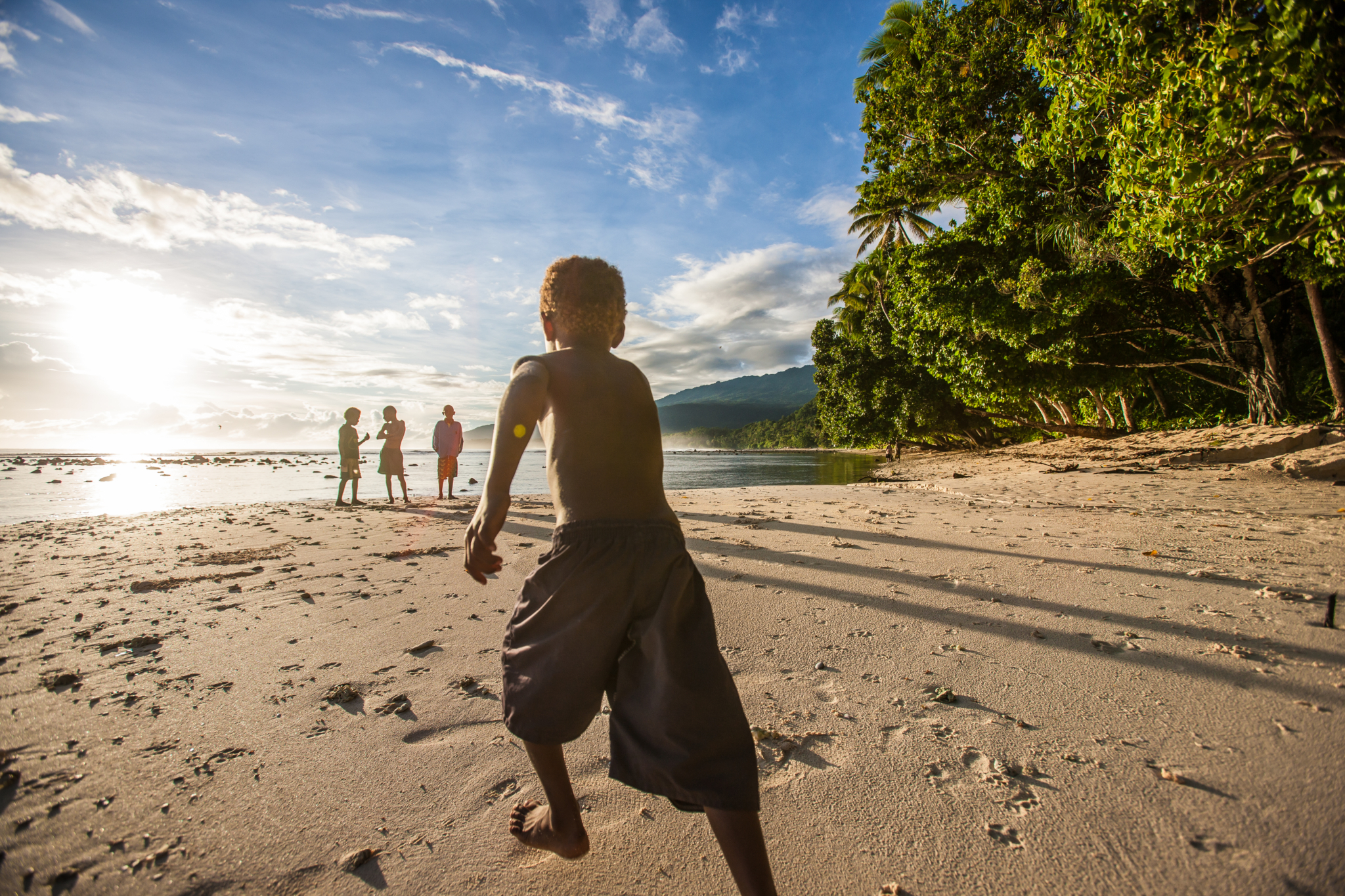 Early morning kids playing Kanabu Village Central New Ireland 2014.