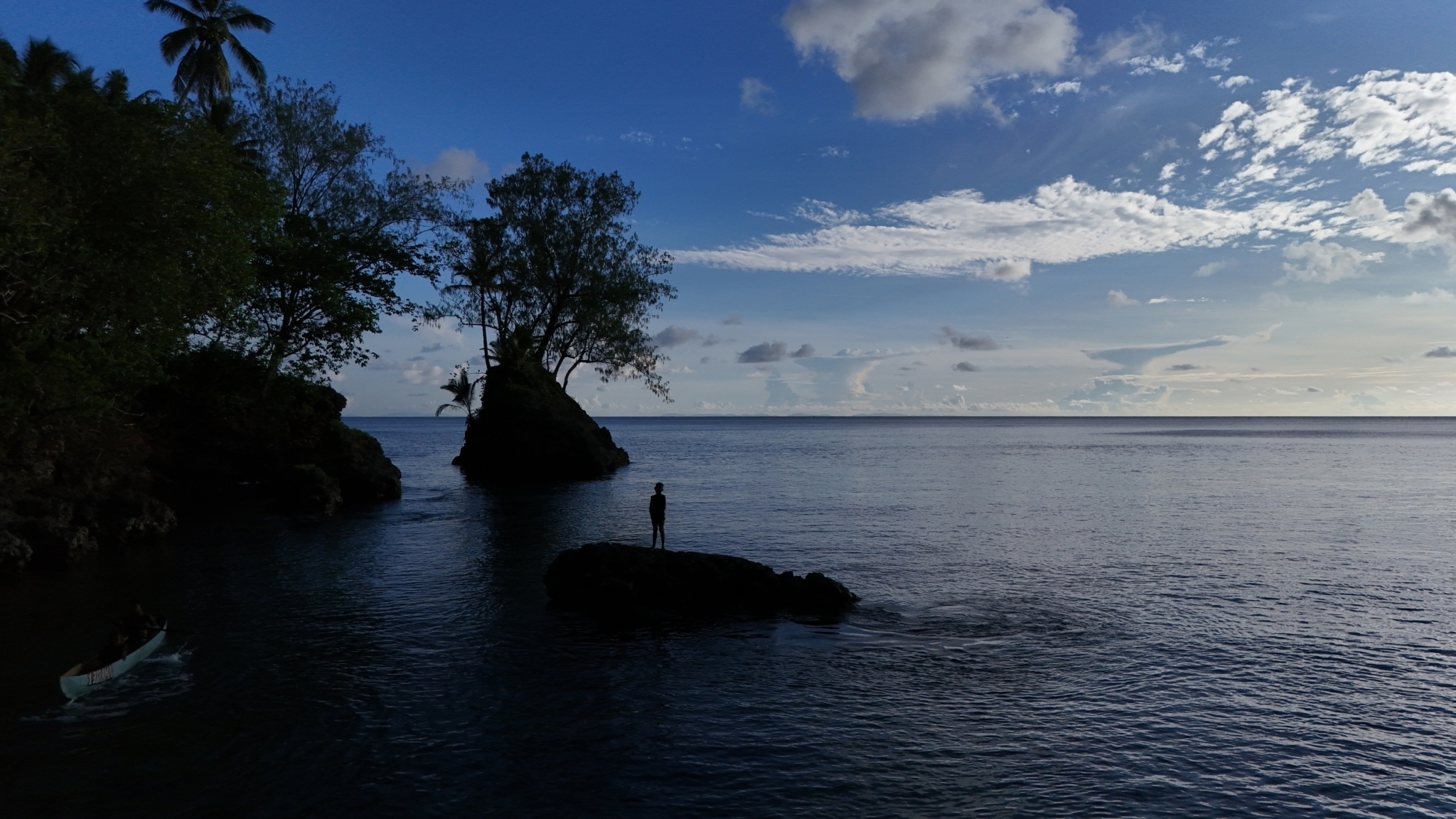 Ulawa Island A little standing on a rock gazing out at sea Haja Village